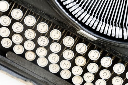 the keys of an old typewriter seen from above. Mechanical tools for writing. Old time journalism