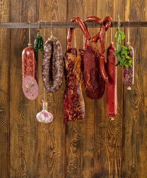 Different kinds of vegetables on a wooden studio background