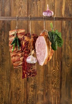 Different kinds of vegetables on a wooden studio background