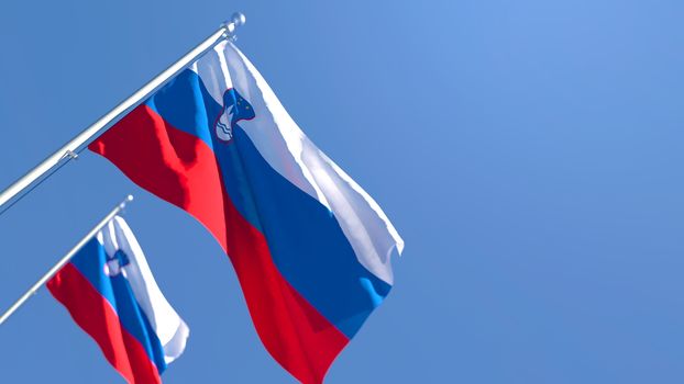 3D rendering of the national flag of Slovenia waving in the wind against a blue sky