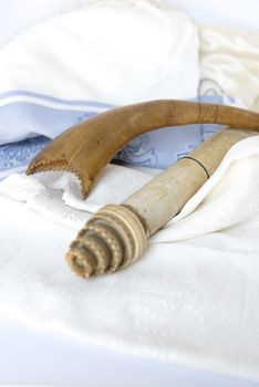 Rosh Hashanah Hashana jewish New Year holiday and Yom Kippur concept with Ram shofar horn ,Rolled Parchment Scroll, Tallit. High quality photo