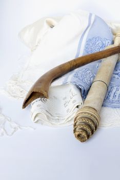 Rosh Hashanah Hashana jewish New Year holiday and Yom Kippur concept with Ram shofar horn ,Rolled Parchment Scroll, Tallit. High quality photo