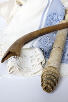 Rosh Hashanah Hashana jewish New Year holiday and Yom Kippur concept with Ram shofar horn ,Rolled Parchment Scroll, Tallit. High quality photo