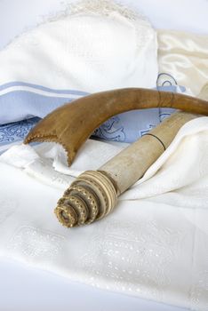 Rosh Hashanah Hashana jewish New Year holiday and Yom Kippur concept with Ram shofar horn ,Rolled Parchment Scroll, Tallit. High quality photo