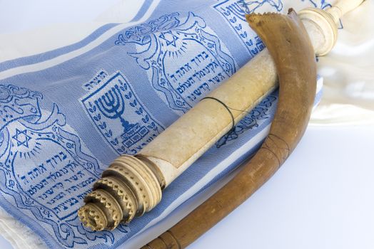 Rosh Hashanah Hashana jewish New Year holiday and Yom Kippur concept with Ram shofar horn ,Rolled Parchment Scroll, Tallit. High quality photo