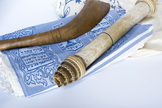 Rosh Hashanah Hashana jewish New Year holiday and Yom Kippur concept with Ram shofar horn ,Rolled Parchment Scroll, Tallit. High quality photo