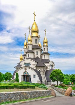 Buki, Ukraine 06.20.2020. Temple Complex with landscape Park in Buki, Ukraine, on a cloudy summer day