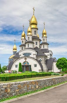 Buki, Ukraine 06.20.2020. Temple Complex with landscape Park in Buki, Ukraine, on a cloudy summer day