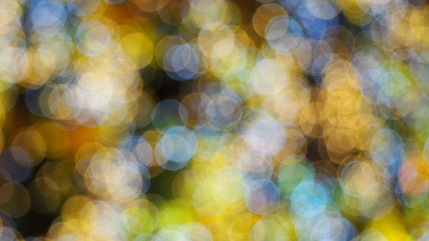 Colorful blurred bokeh lights in the night time.