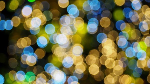 Colorful blurred bokeh lights in the night time.