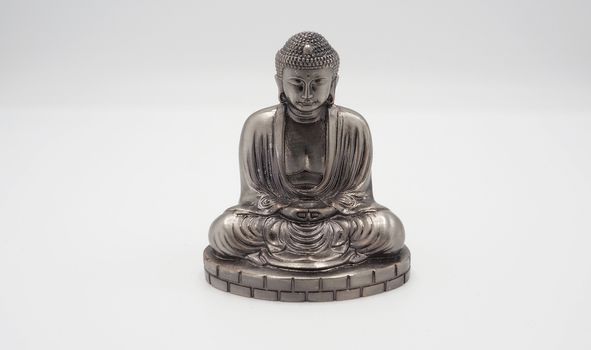 Great buddha or Daibutsu silver model of Kamakura temple Japan.