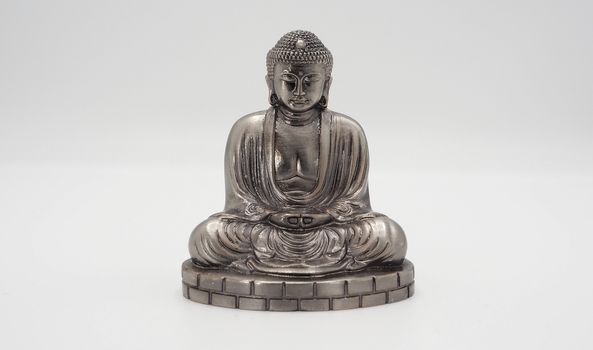 Great buddha or Daibutsu silver model of Kamakura temple Japan.