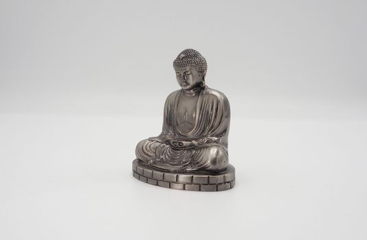 Great buddha or Daibutsu silver model of Kamakura temple Japan.