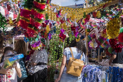 Colorful sukkah decorations. Sukkot four species festival. Shimmering decorations for party.