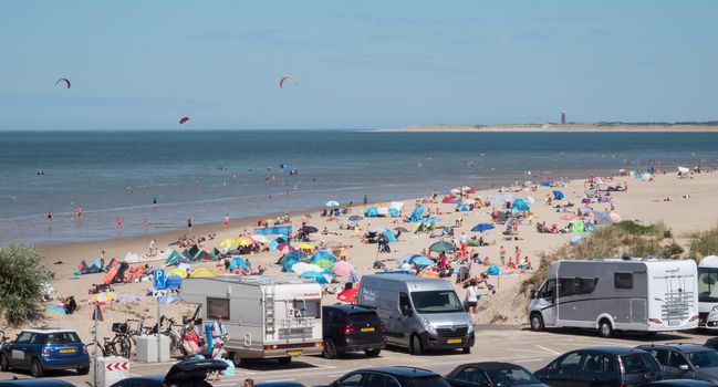 Ouddorp,Holland,07-aug-2020: people travel to the coast in summer time with camer and caravan, this place is always a tourist attraction at the brouwersdam