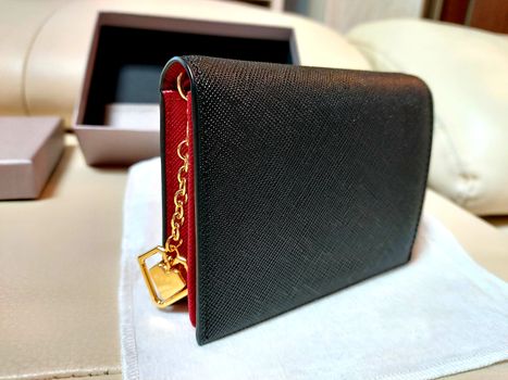 Black leather wallet on display