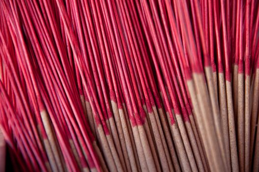Red classical old incense joss sticks in group at Asian temple in Taiwan