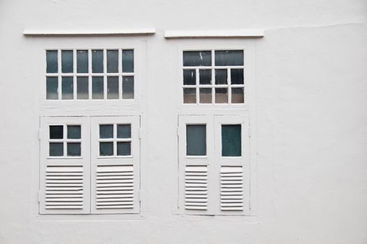 White classic window on white wall