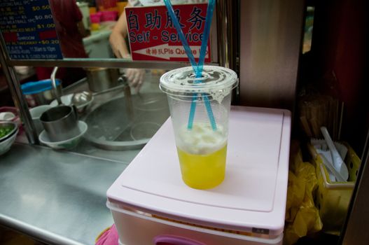 Sugarcane cold drink in Singapore hawker center