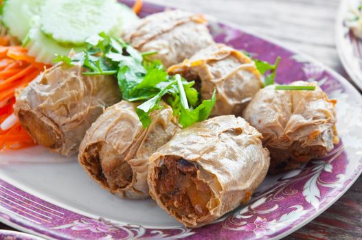 Minced crab sausages fried on a plate