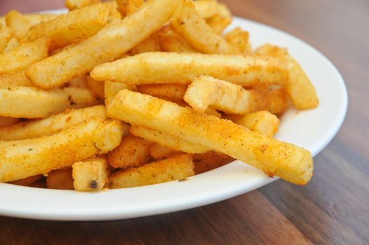 Close up of golden spice french fries