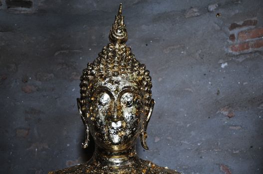 Golden Buddha statue face