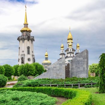 Buki, Ukraine 06.20.2020. Temple Complex with landscape Park in Buki, Ukraine, on a cloudy summer day