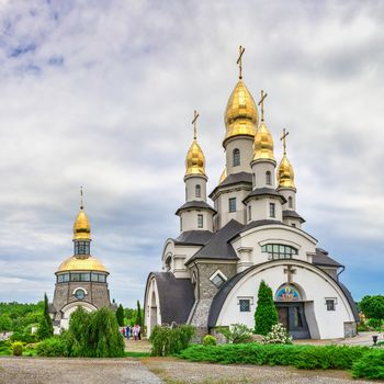 Buki, Ukraine 06.20.2020. Temple Complex with landscape Park in Buki, Ukraine, on a cloudy summer day