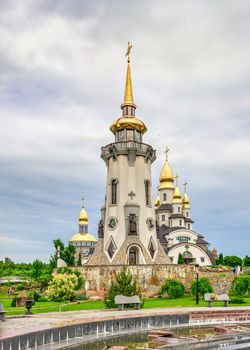 Buki, Ukraine 06.20.2020. Temple Complex with landscape Park in Buki, Ukraine, on a cloudy summer day