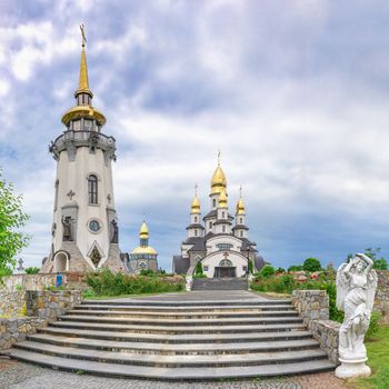 Buki, Ukraine 06.20.2020. Temple Complex with landscape Park in Buki, Ukraine, on a cloudy summer day