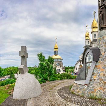 Buki, Ukraine 06.20.2020. Temple Complex with landscape Park in Buki, Ukraine, on a cloudy summer day