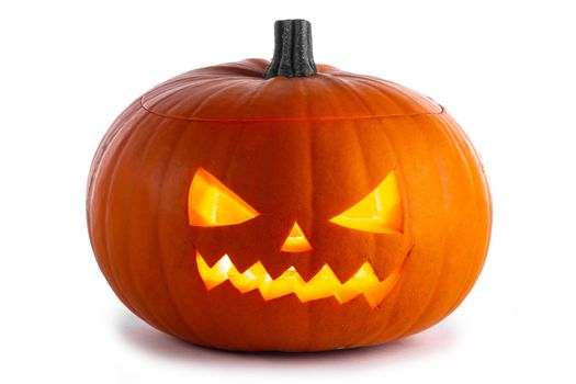 Glowing angry Halloween Pumpkin isolated on white background