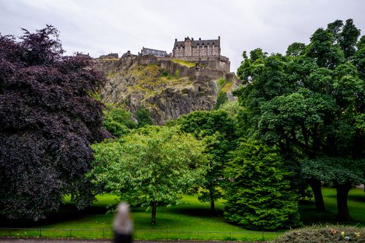 View of old Edinburgh, Scotland on a sunny day from Princes Street Gardens