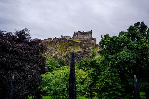 View of old Edinburgh, Scotland on a sunny day from Princes Street Gardens