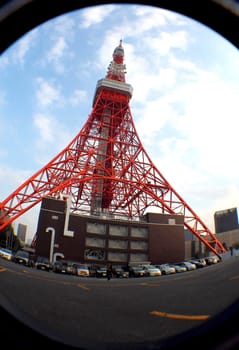 Tokyo tower red and white color steel metal and blue sky.