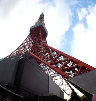 Tokyo tower red and white color steel metal and blue sky.