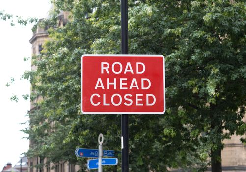 Red warning road closed sign