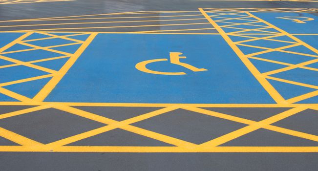 disabled parking yellow and blue sign