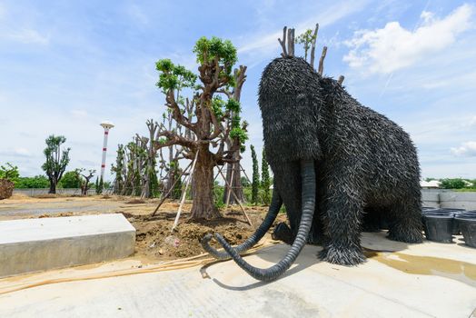 NakhonPathom , Thailand -  6  August, 2020 : Big Mammoth model recycle made from old Car tire in  Caltex petrol station in NakhonPathom KM.14