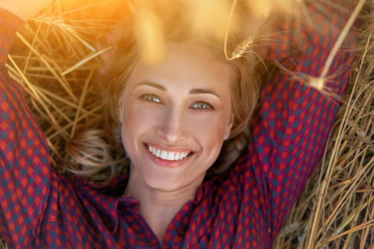 Woman farmer lie farmland smiling Female agronomist specialist farming agribusiness Happy positive caucasian worker agricultural field dressed red checkered shirt and bandana Red plaid shirt.