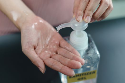 Hand wash with disinfectant gel dispenser during the epidemic covid-19.