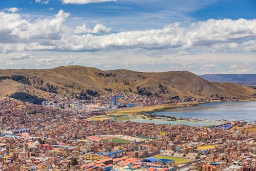 Panorama of peruvian city Puno and lake Titicaca, Peru