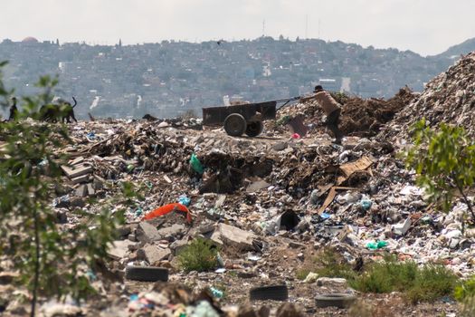 A huge landfill for waste disposal. Accumulation of garbage in landfill or deposit. Pollution concept.