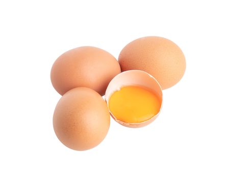 three eggs and broken raw egg isolated on the white background with clipping paths