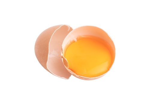 Egg yolks in a broken shell isolated on the white background with clipping paths