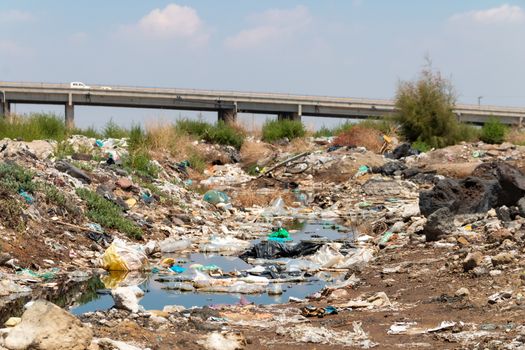 River polluted by plastic waste. Pollution concept. Recycling. Global warming