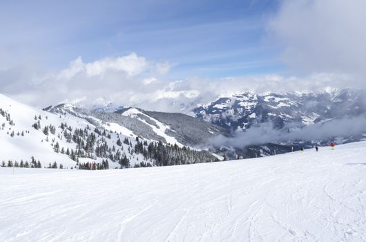 view on the top of Smittenhohe mountain at Kaprun ski area Blue sky sunny winter day.