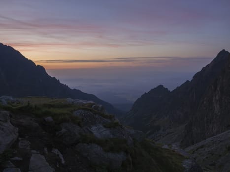 Orange Sunset or sunrise sk, view form teryho chata cabin to valley, High Tatras mountains, Slovakia.