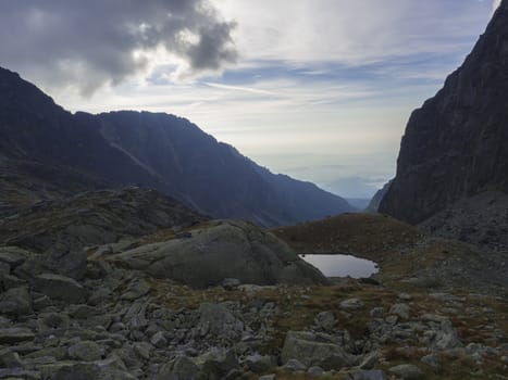 view on mountain lake Nizne Spisske pleso at the end of the hiking route to the Teryho Chata mountain shelter in the High Tatras in Slovakia.