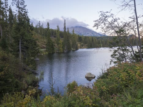 Mountain lake Strbske pleso in National Park High Tatra, Slovakia, Europe, summer at dusk.